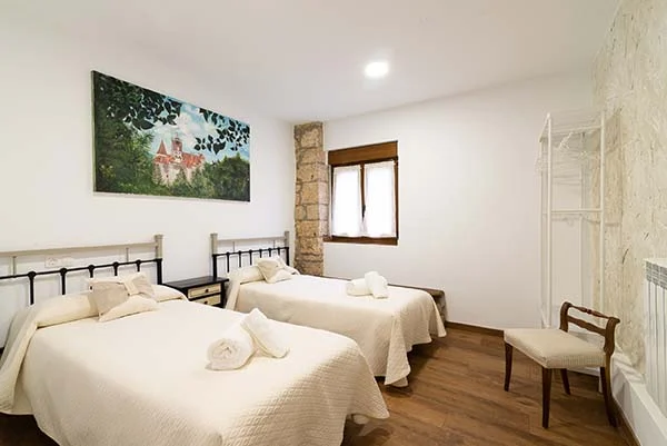 Dormitorio de camas individuales de Casa de la Ribera
